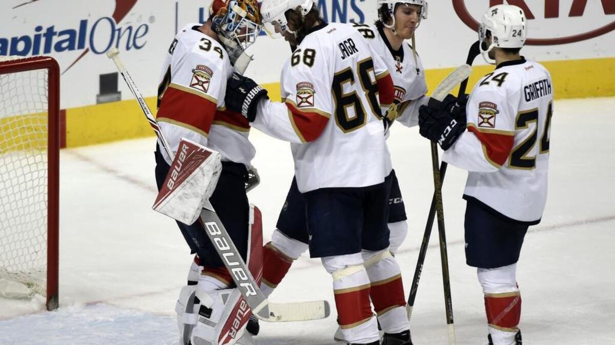 Florida goalie James Reimer is congratulated by Jaromir Jagr alongside Michael Sgarbossa and Seth Griffith following Saturday’s 3-1 win over host Dallas.
