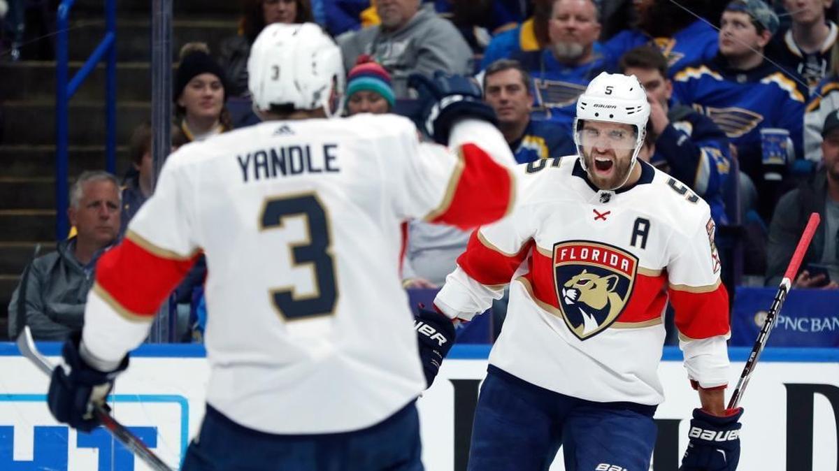 The Florida Panthers’ Aaron Ekblad, right, is congratulated by teammate Keith Yandle (3) after scoring during the first period of an NHL hockey game against the St. Louis Blues on Tuesday, Jan. 9, 2018, in St. Louis.