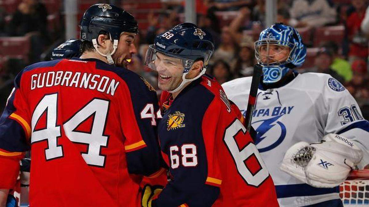 
Panthers forward Jaromir Jagr (68) celebrates after getting an assist on Sasha Barkov’s goal in the second period against the Lightning. The Panthers had scored 11 goals in nine games before Jagr’s arrival; they have scored nine goals over two games since joined the team. 
