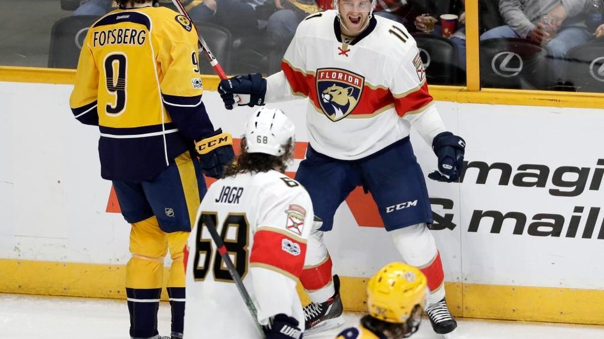 Florida’s Jonathan Huberdeau celebrates a goal with Jaromir Jagr during the Panthers’ victory over the host Nashville Predators on Feb. 11.