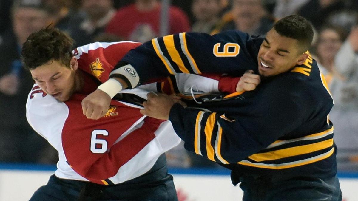 Florida Panthers defenseman Alex Petrovic (6) gets into a fight for the third time in the game with Buffalo Sabres left winger Evander Kane (9) during the third period Tuesday, Feb. 9, 2016 in Buffalo, N.Y. Florida won 7-4.
