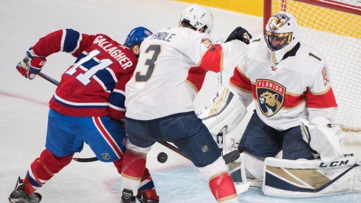 Montreal Canadiens right wing Brendan Gallagher (11) moves in on Florida Panthers goaltender Roberto Luongo (1) as defenseman Keith Yandle (3) defends during second period NHL hockey action in Montreal, Monday, March 19, 2018.