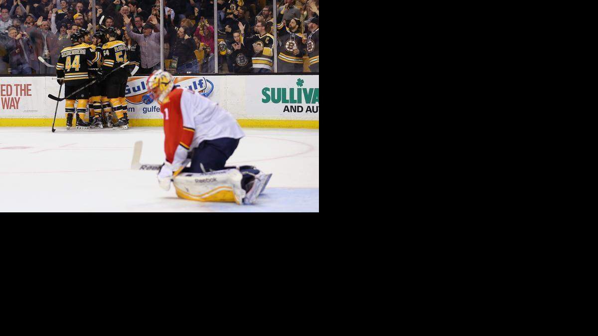 
Panthers goaltender Roberto Luongo looks down after Milan Lucic scored the Bruins’ game-winning goal Tuesday, March 31, 2015 in Boston. 
