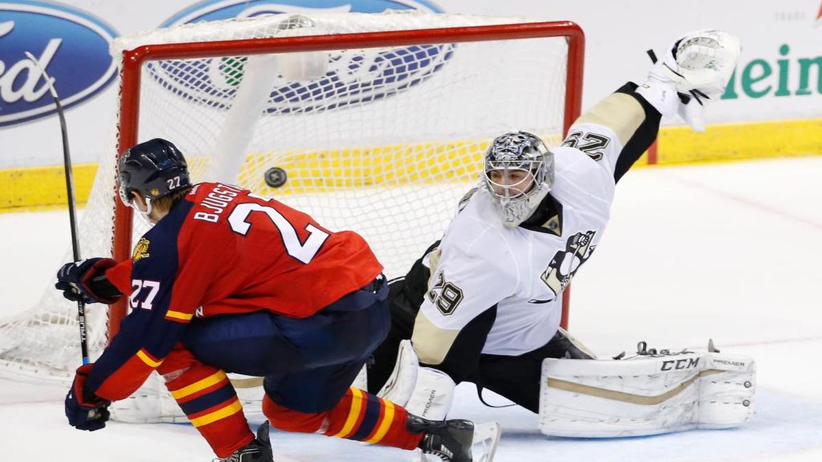 Panthers center Nick Bjugstad scores on Penguins goalie Marc-Andre Fleury during Monday night’s shootout.