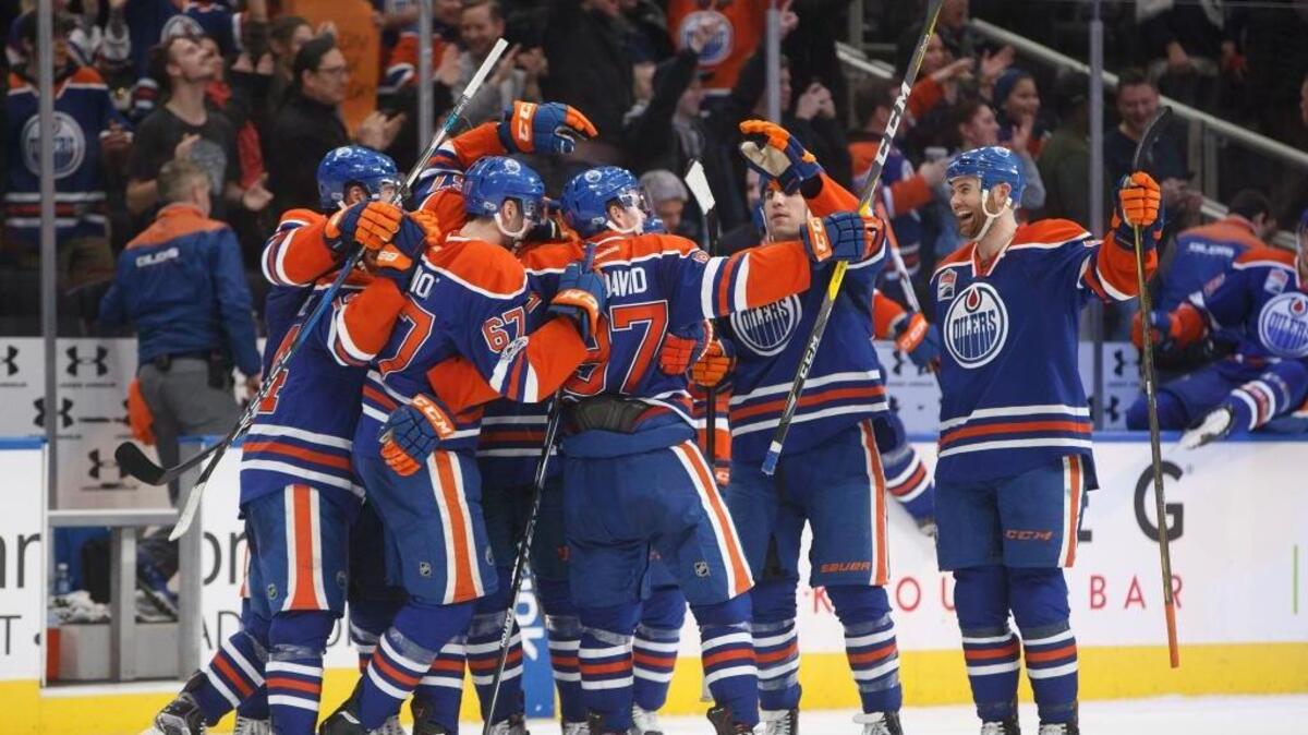 The Edmonton Oilers celebrate their overtime win over the Florida Panthers Wednesday night.