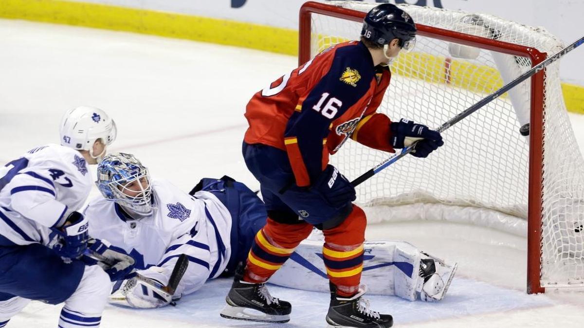 Florida Panthers center Aleksander "Sasha" Barkov (16) scores a goal against Toronto Maple Leafs goalie James Reimer (34) during the second period Tuesday, Jan. 26, 2016, in Sunrise, Fla.