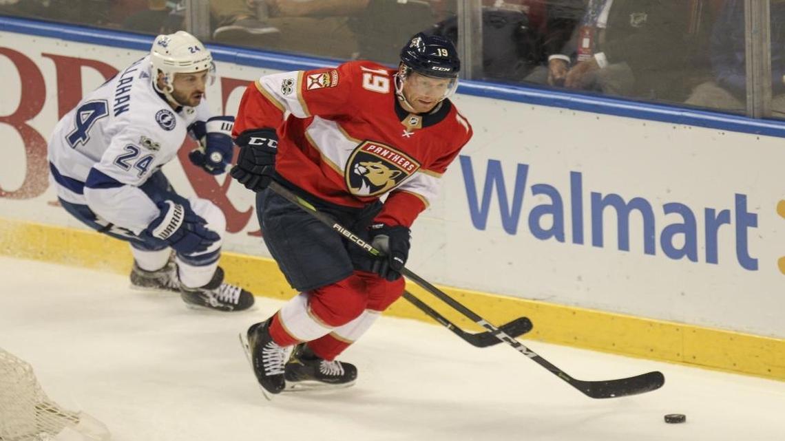 Florida Panthers defenseman Mike Matheson (19) wins possession of the puck against Tampa Bay Lightning right wing Ryan Callahan (24) during the first period of an NHL hockey game at the BB&T Center on Saturday, Oct. 7, 2017 in Sunrise.