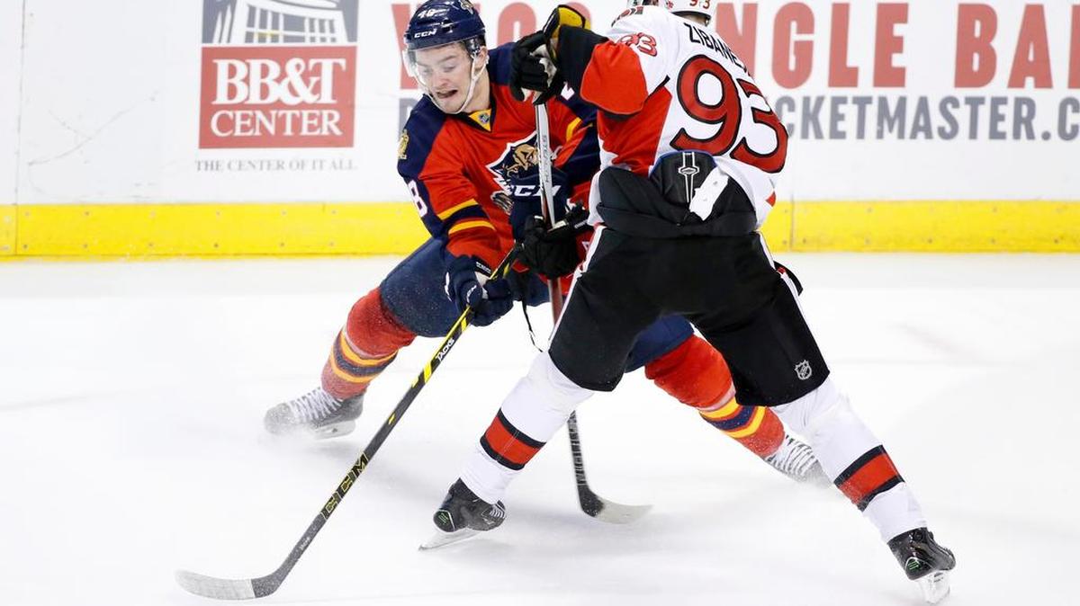 Rookie Logan Shaw, left, was on the Panthers’ fourth line on Wednesday night in place of veteran Shawn Thornton. Shaw became the 11th Panther to make their playoff debut.