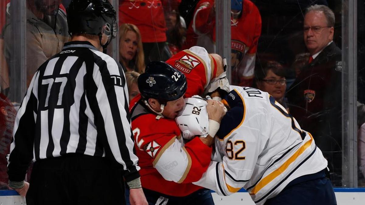 Florida’s Shawn Thornton battles it out with Buffalo’s Marcus Foligno during a game at BB&T Center on Dec. 20.
