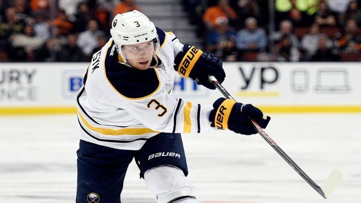 Buffalo Sabres defenseman Mark Pysyk (3) attempts a shot during the third period of an NHL hockey game against the Anaheim Ducks in Anaheim, Calif., Wednesday, Feb. 24, 2016.