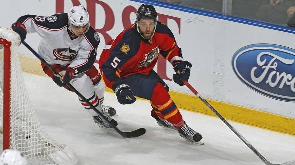 Florida defenseman Aaron Ekblad is pursued by Columbus forward Rene Bourque in a game on Dec. 27, 2015, in Sunrise.
