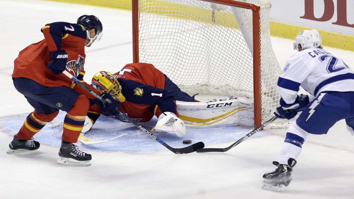 
Tampa Bay Lightning right wing Ryan Callahan is denied as Panthers’ goalie Roberto Luongo, and Dmitry Kulikov defend in the first period Saturday night in Sunrise.
