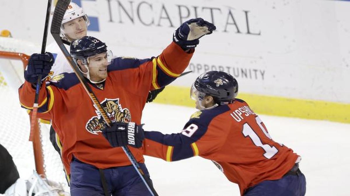 <cutline_leadin>scoring not a problem: </cutline_leadin>The Panthers’ Jimmy Hayes, left, celebrates with teammate Scottie Upshall after a second-period goal in Saturday’s losing cause.