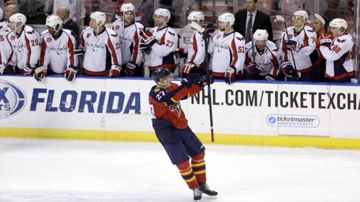 
Florida Panthers center Nick Bjugstad (27) celebrates after scoring the game-winning goal in a shootout of an NHL hockey game against the Washington Capitals, in Sunrise, Fla., Tuesday, Dec. 16, 2014. 
