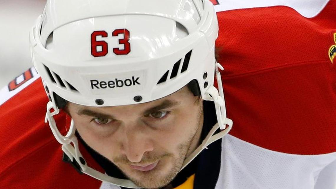 Florida Panthers center Dave Bolland looks at the puck during the first period against the New Jersey Devils, Saturday, Jan. 31, 2015, in Newark, N.J.