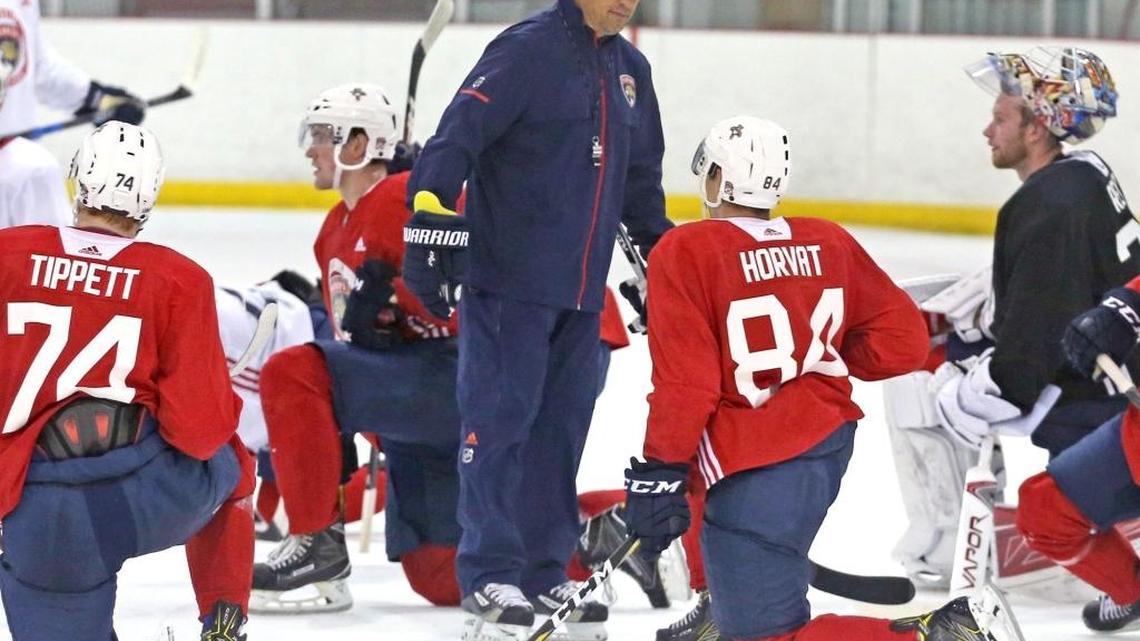 Florida Panthers coach Bob Boughner on the ice with players during their first practice of the season in Coral Springs on Friday.