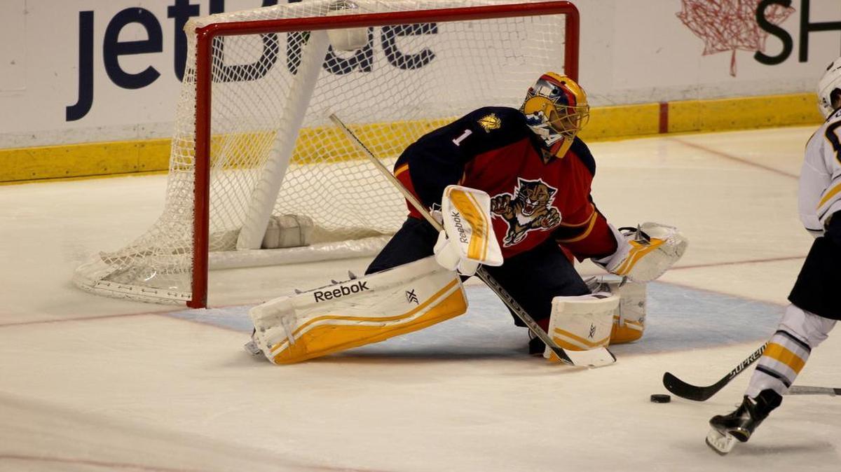 
The Panther's goalie Roberto Luongo prepares to deflect a shot against the Buffalo Sabre's Marcus Foligno. The Panthers have Luongo under contract for the next seven seasons.
