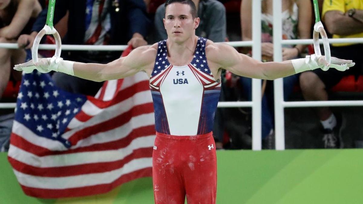 United States' Alexander Naddour performs on the rings during the artistic gymnastics men's qualification at the 2016 Summer Olympics in Rio de Janeiro, Brazil, on Saturday.