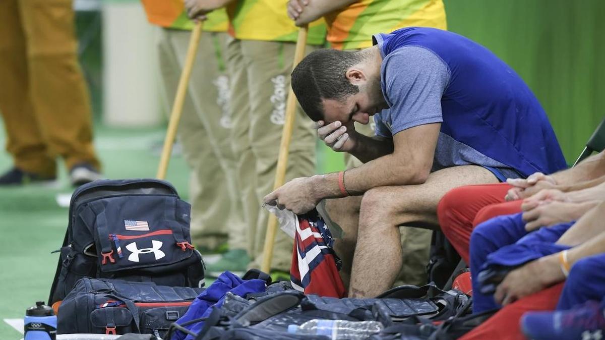 United States men's gymnast Danell Leyva sat on the USA men's team bench after falling in the high bar apparatus in the men's team final at Rio Olympic Arena on Monday at the 2016 Summer Olympics Games in Rio de Janeiro, Brazil. The United States finished fifth overall.