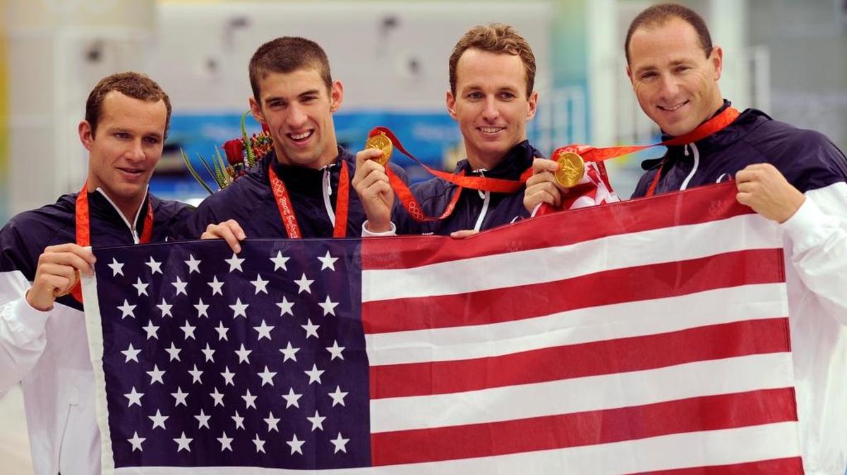From left, Brendan Hansen, Michael Phelps, Aaron Peirsol and Jason Lezak show their gold medals after the 400-meter medley relay in 2008. Lezak anchored the U.S. to gold in the 400 freestyle relay as well.