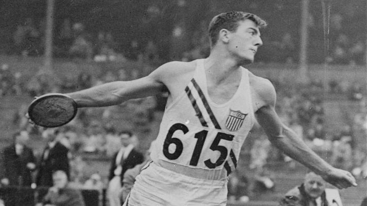 Bob Mathias, Tulare, Calif., high school boy, makes mighty discus toss in Wembley England Stadium August 6, 1948 to take lead in the Decathlon in the London Summer Olympics. Mathias, 17, hurled the discus for a distance of 144 feet 4 inches to top the field. Toss earned him 834 points and boosted his Decathlon total to 5,500 points.