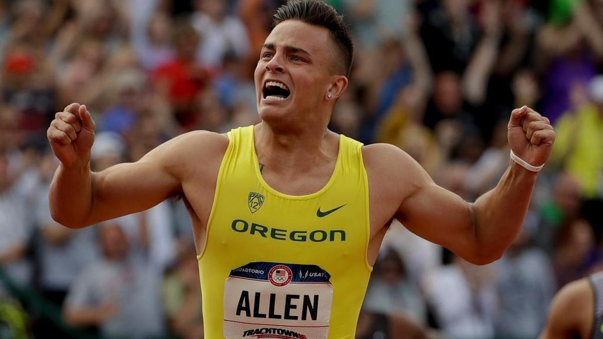 Devon Allen celebrates his win in the finals of the men’s 110-meter hurdles at the U.S. Olympic Track and Field trials in Eugene, Oregon, in July. Allen also is a player for the Oregon Ducks football team.