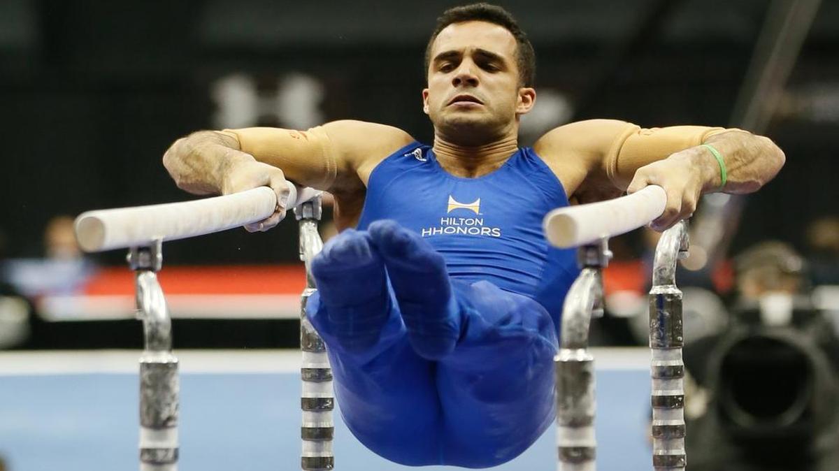 
Danell Leyva competes on the parallel bars at the U.S. men's gymnastic championships on Sunday, Aug. 24, 2014, in Pittsburgh.
