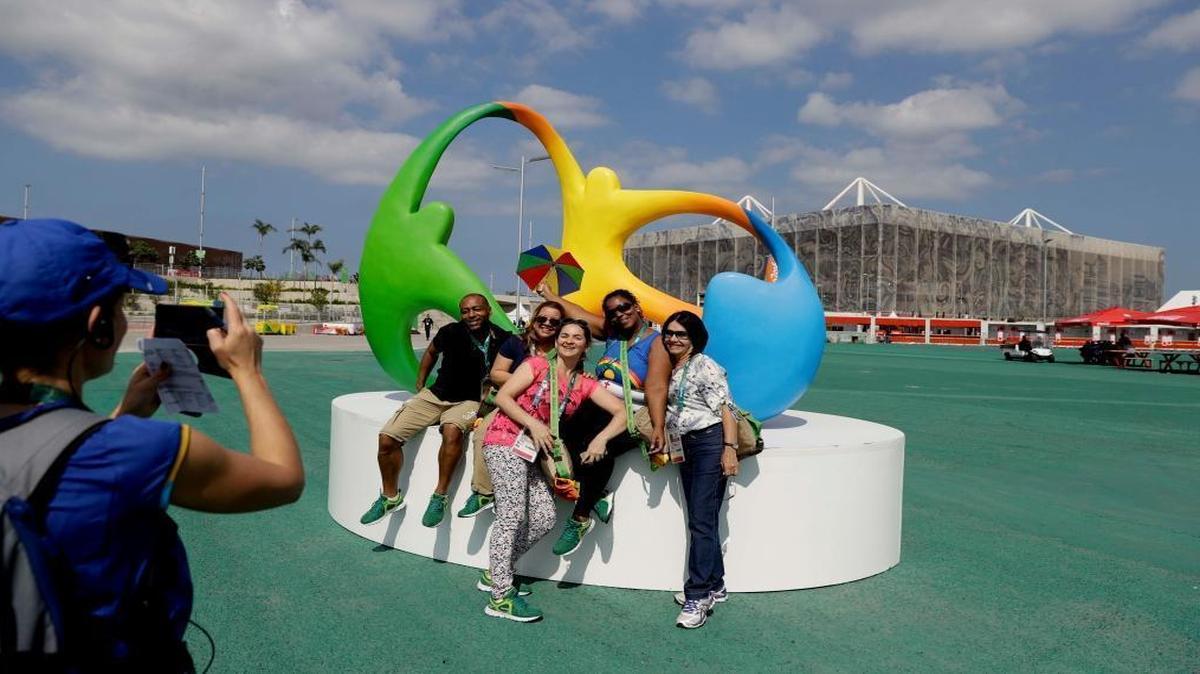 Volunteers pose for a picture at the Olympic Park in Rio de Janeiro on Thursday as Brazil prepares to host the 2016 Summer Olympics. The Opening Ceremonies are Friday night at Maracana Stadium.