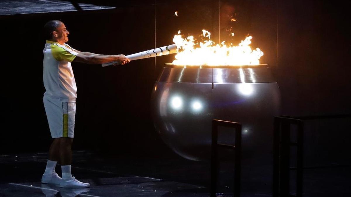 Vanderlei de Lima lights the Olympic flame during the opening ceremony for the 2016 Summer Olympics in Rio de Janeiro, Brazil, Fri., Aug. 5, 2016.