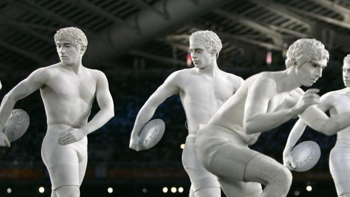 Performers dressed as ancient Greek athletes pose during the Opening Ceremonies of the 2004 Olympic Games in Athens on Aug. 13, 2004.