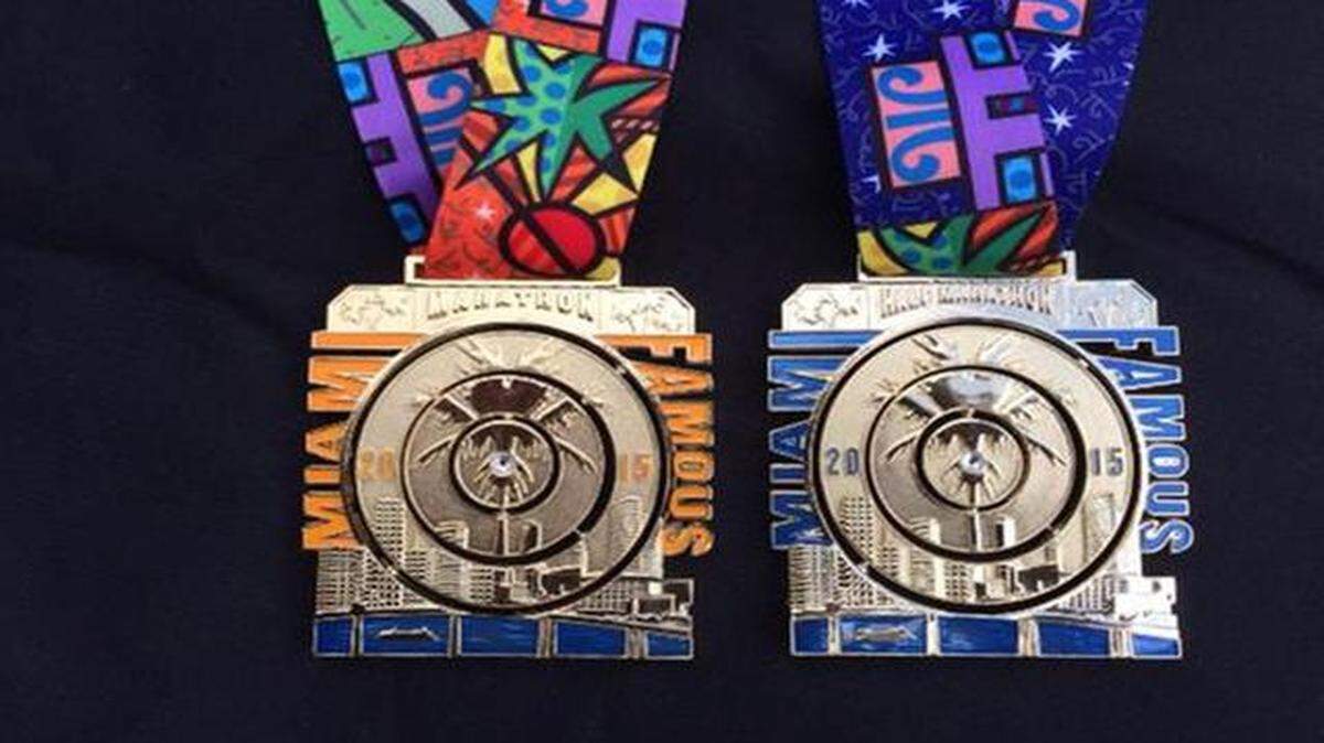 
The Miami Marathon and Half-Marathon participant medals are shown.

