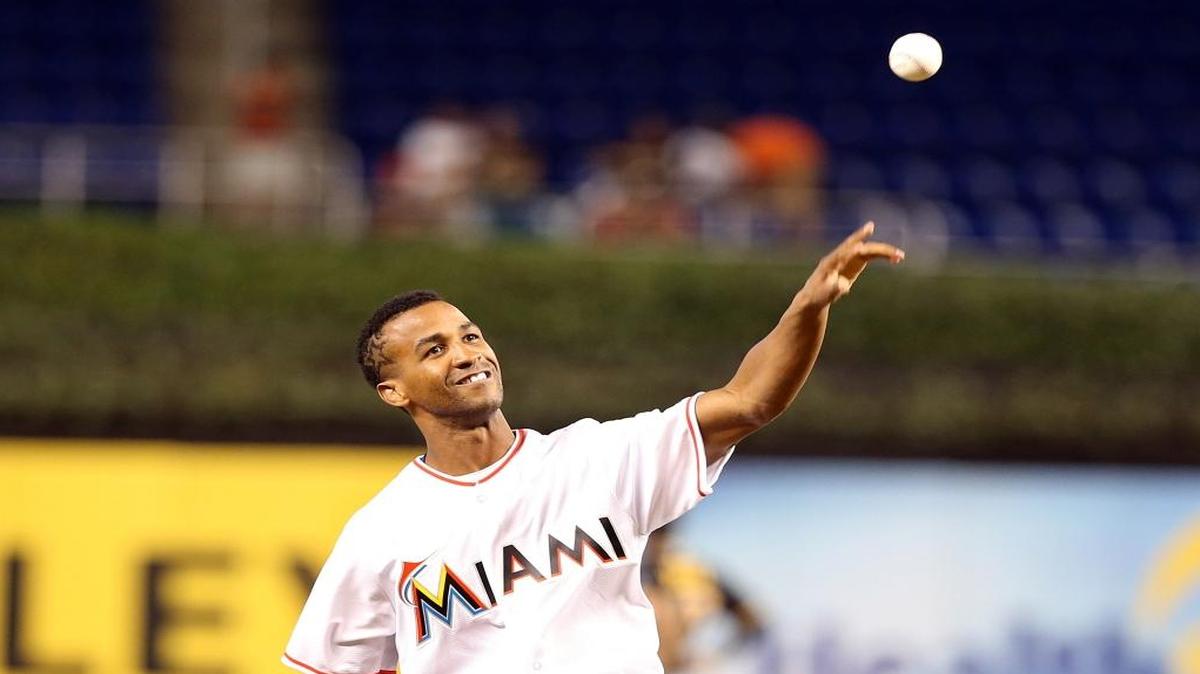 Boxing champ Rances Barthelemy, throws the first pitch at the Miami Marlins and Pittsburgh Pirates game at Marlins Park in Little Havana in Miami on Thurs., June 2, 2016.