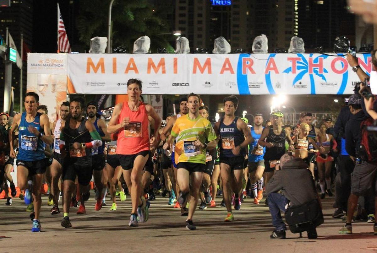 Thousands of runners participate in the Miami Marathon under cold and wet conditions on Jan. 29, 2017. The marathon had a new title sponsor, Fitbit, for the 2018 race.