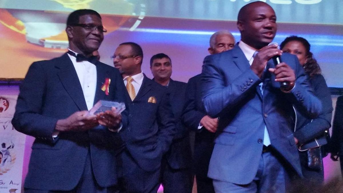 West Indies cricket legend Brian Lara of Trinidad and Tobago speaks during the inaugural Cricket Legends Weekend as event organizer Lawrence Rowe looks on Saturday, Jan. 24, 2015.