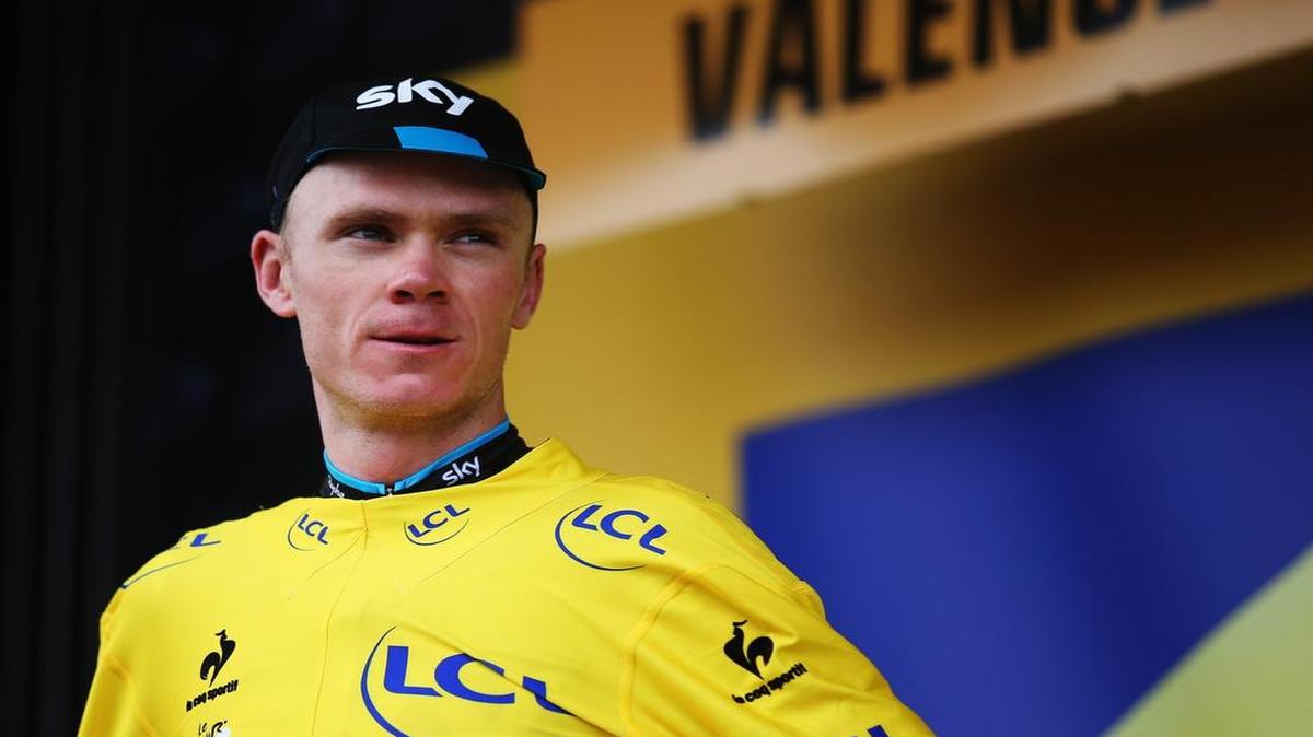 
Chris Froome of Great Britain and Team Sky celebrates retaining the overall leaders yellow jersey at the finish of Stage 15 of the Tour de France, a 183km rolling stage from Mende to Valence, on July 19, 2015 in Valence, France.

