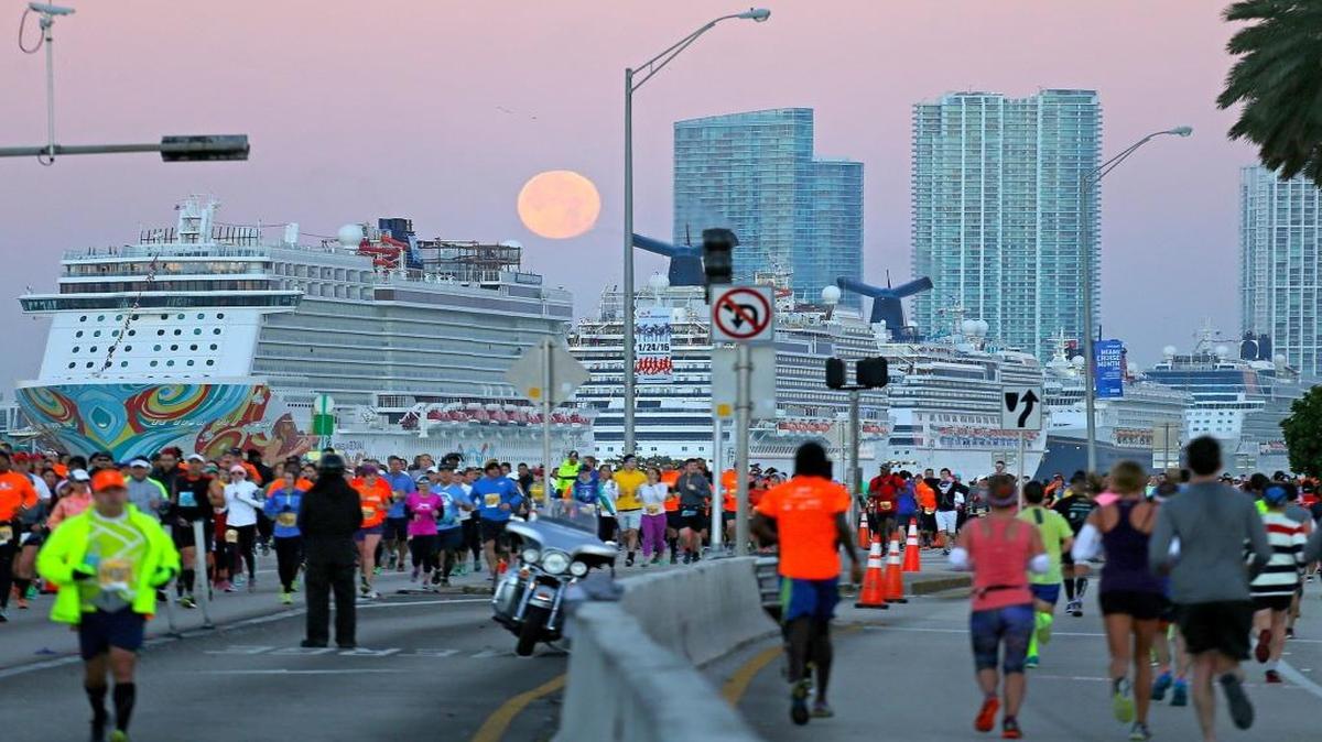 Runners travel on the MacArthur Causeway during the Miami Marathon and Half Marathon on Sunday, Jan. 24, 2016.