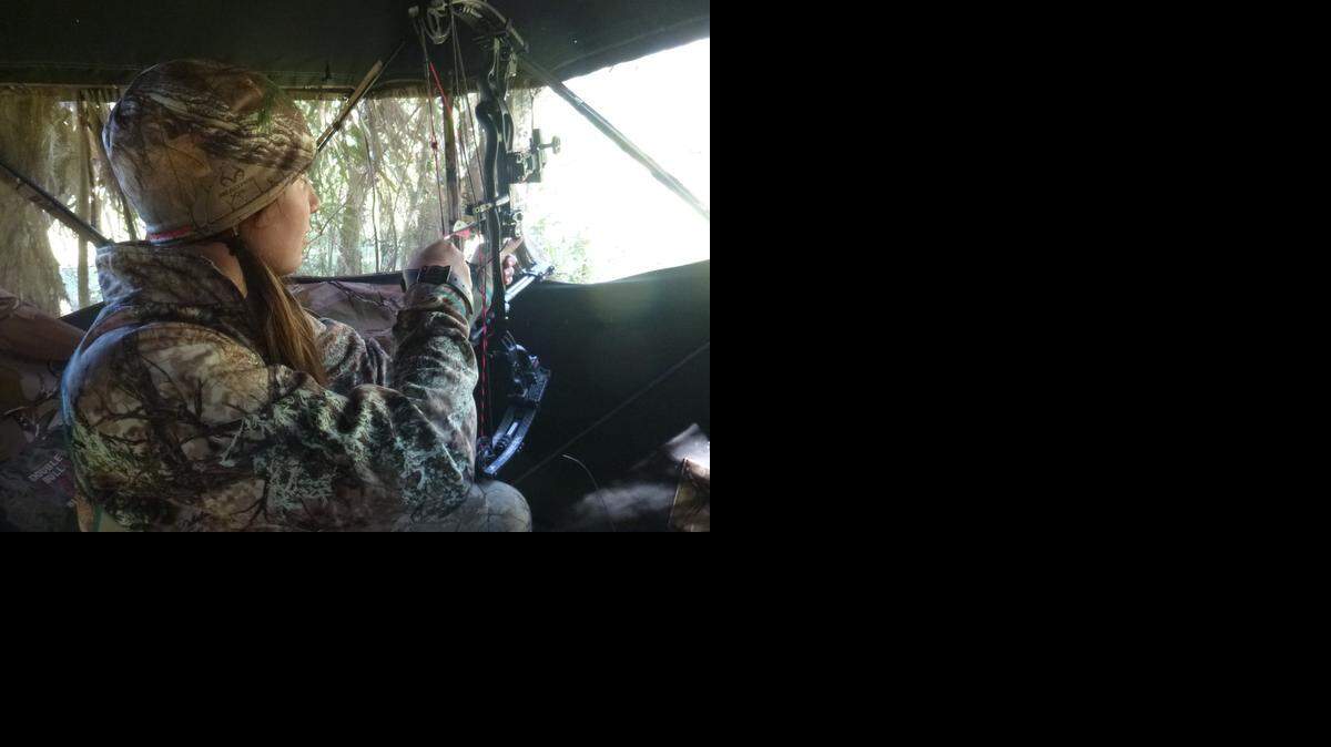 
Taking aim: Kasi Geraci of Coral Gables sets up with her bow from a ground blind at the ranch of her boyfriend’s family near Lake Okeechobee.

