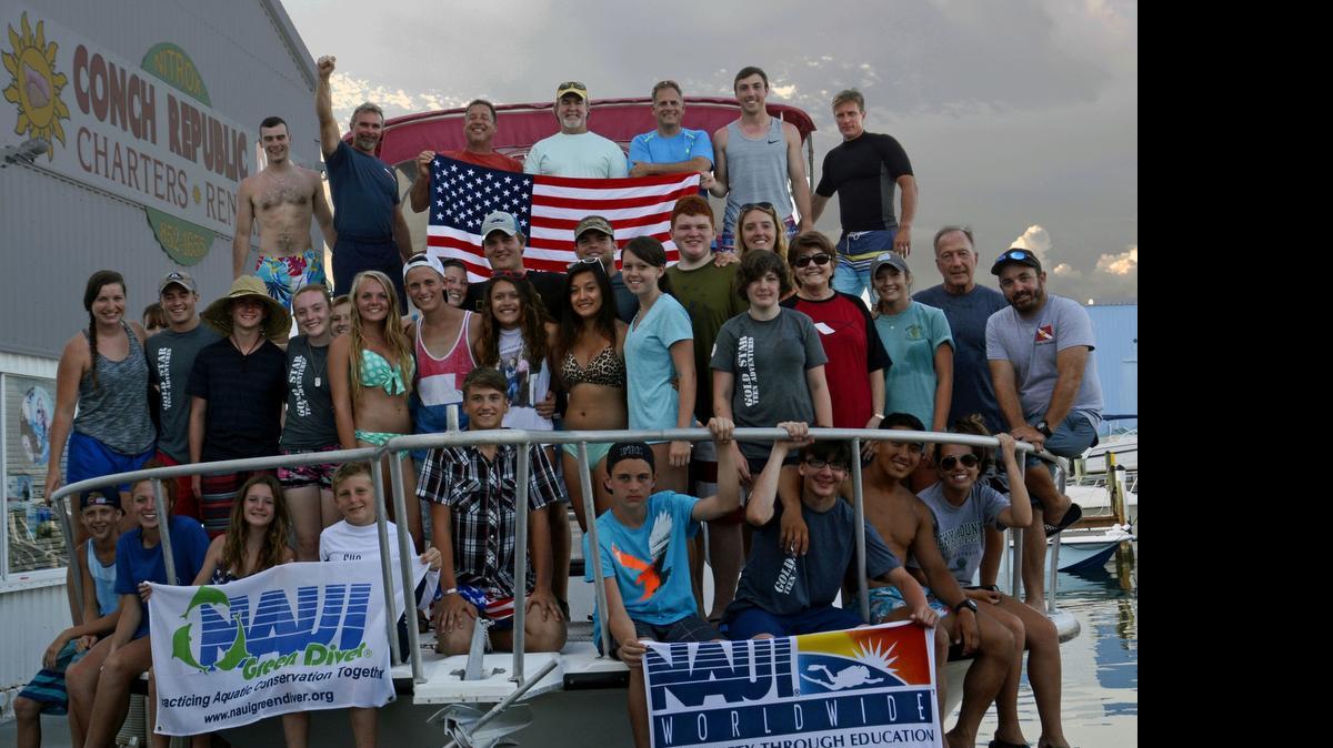 
Children of the Gold Star Teen Adventures group gather on a Conch Republic Divers boat in Tavernier this week. Members of the group all have parents who died while serving as special operations soldiers, sailors, airmen or Marines.
