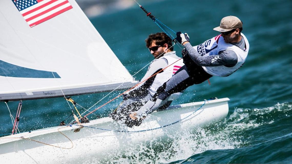 Skipper Stu McNay (L) and crew Dave Hughes (R) moved up to first place Friday in the Sailing World Cup Miami men's 470 fleet with four races remaining on Biscayne Bay. Hughes is from Coconut Grove.
