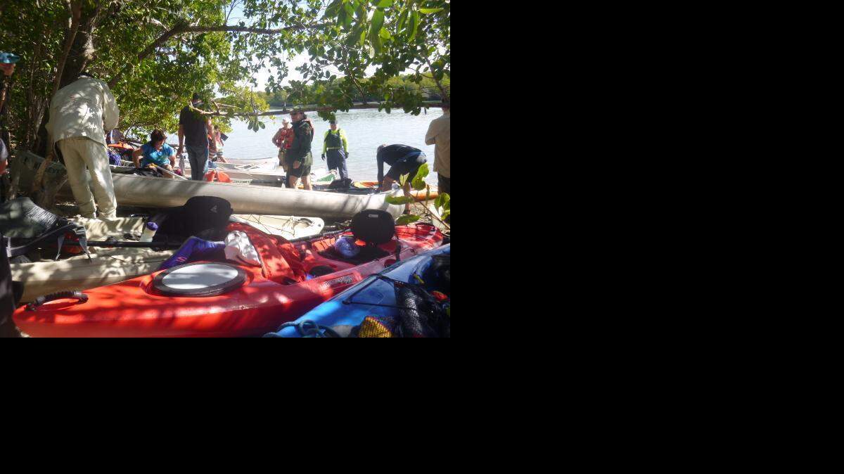 
A gaggle of “try-athletes” and their paddle craft cover Sandfly Island in Everglades National Park.
