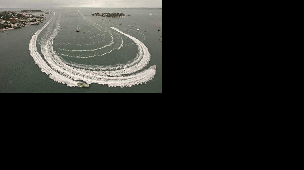 
In this photo provided by the Florida Keys News Bureau, Superboat Unlimited class boats make the turn in Key West Harbor during the Key West World Championship on Nov. 5, 2014, in Key West.
