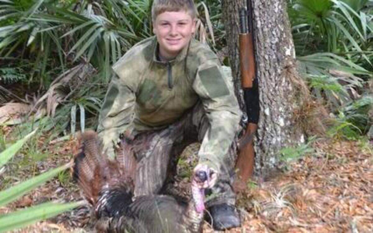 
Gage Clements with his first turkey gobbler, harvested at a family friend’s private lease in Central Florida.
