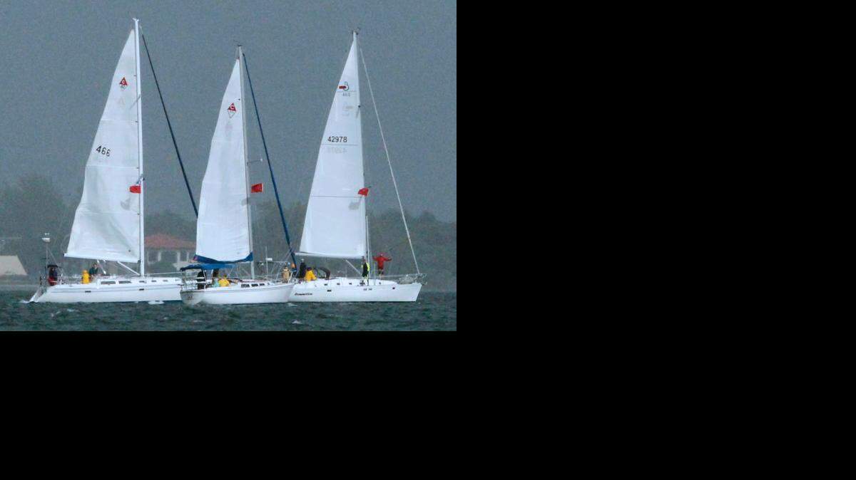 <cutline_leadin>And they’re off:</cutline_leadin> Three sailboats are shown at the start of the 2011 Bacardi Columbus Day Regatta <137>LVII Oct. 8, 2011 <137>in Coconut Grove. This year’s race is Oct. 11-12. <137>The competition finishes Sunday.<137>