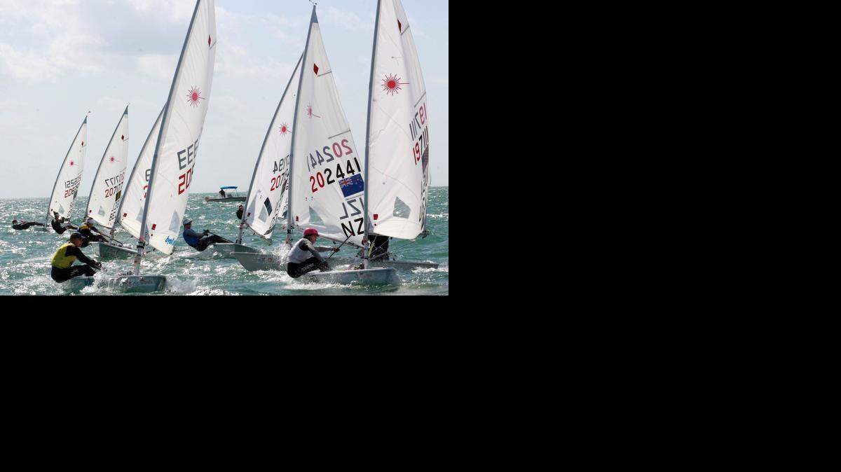 
Teams from around the world race in the Laser Radial, womens one person dinghy, during the final day of competition in the ISAF World Cup Miami on Biscayne Bay in Miami on Jan. 31, 2015.
