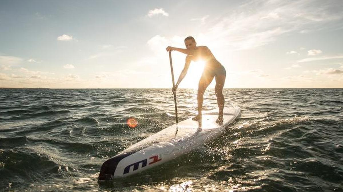 
Professional standup paddleboarder Seychelle Hattingh glides through the water on her standup paddleboard. Hattingh, a 2005 Coral Shores High School graduate, will attempt to break the distance record for a 24-hour period in December. 

