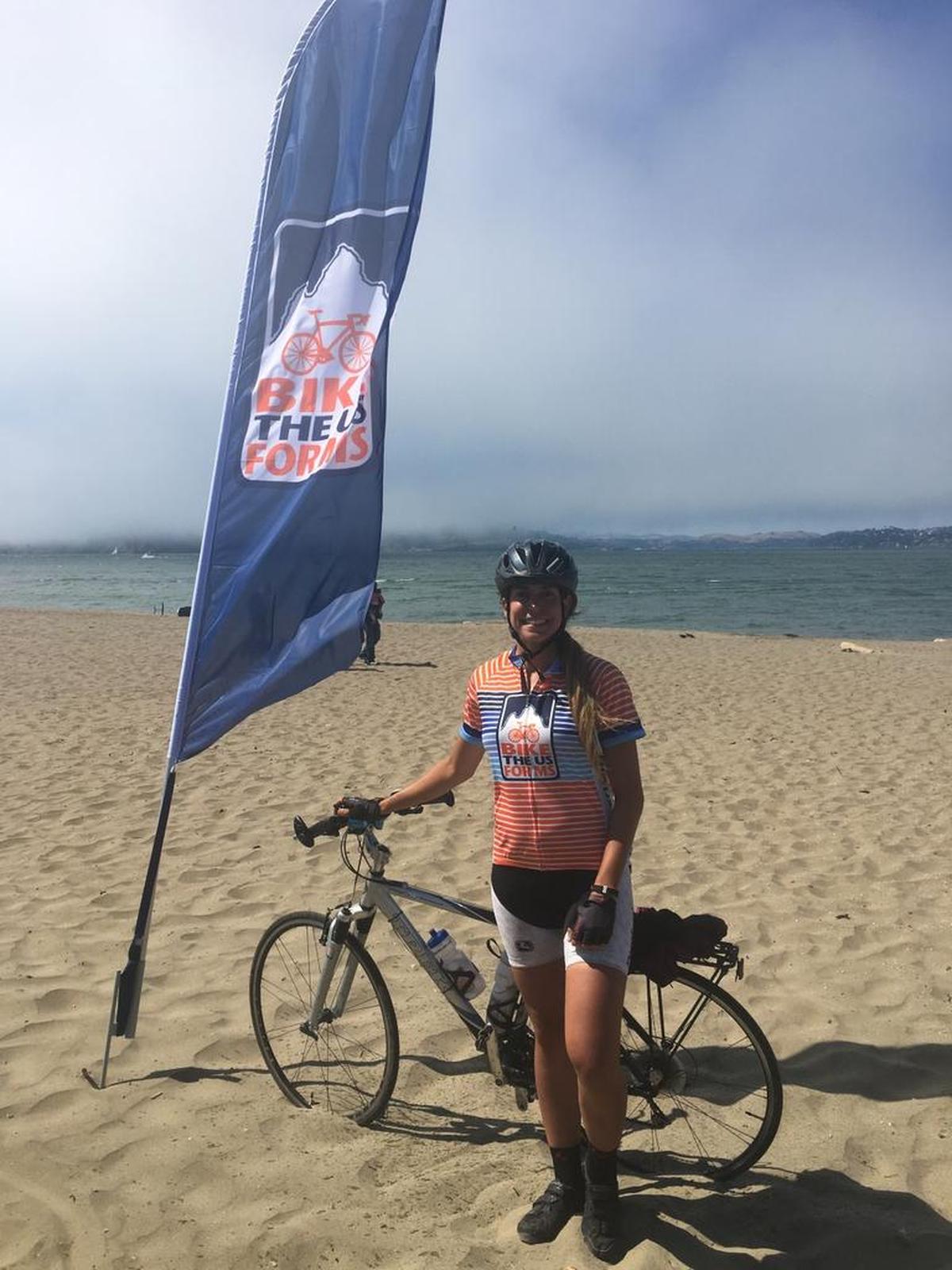 Julie Brito makes it to final destination, Crissy Field Golden Gate Beach in San Francisco, after 781 total miles completed.