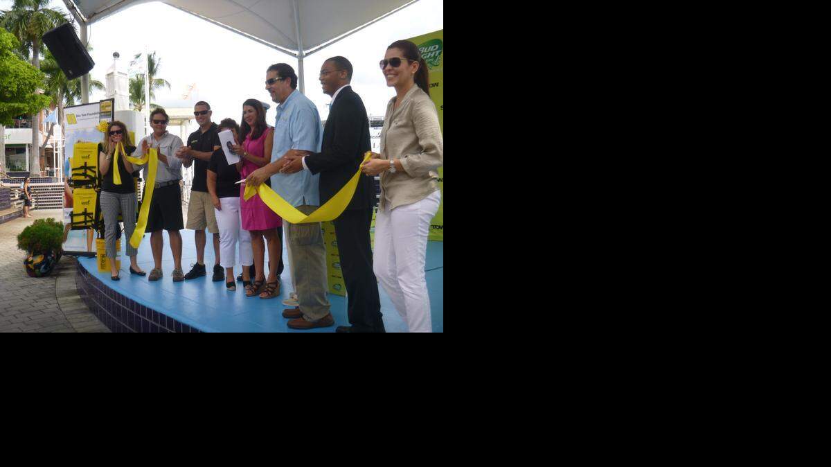 
Representatives of Sea Tow and others cut a ribbon on the stage at Miami’s Bayside Marketplace Wednesday to introduce an expanded life jacket loaner program in Miami-Dade and Keys.
