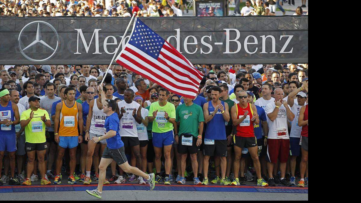 
Runners prepare for the start of the 2013 Miami Corporate Run. 
