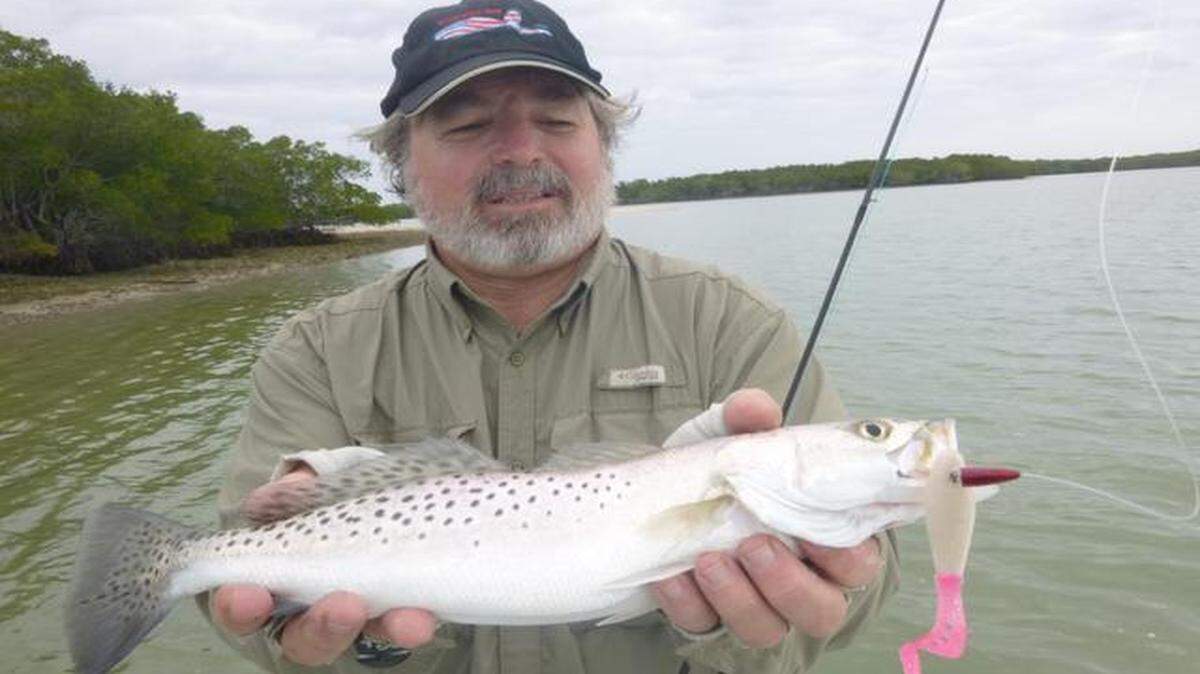 
Captain Skip Strong holds a sea trout he caught using a MrWiffelure in the Ten Thousand Islands in southwest Florida.

