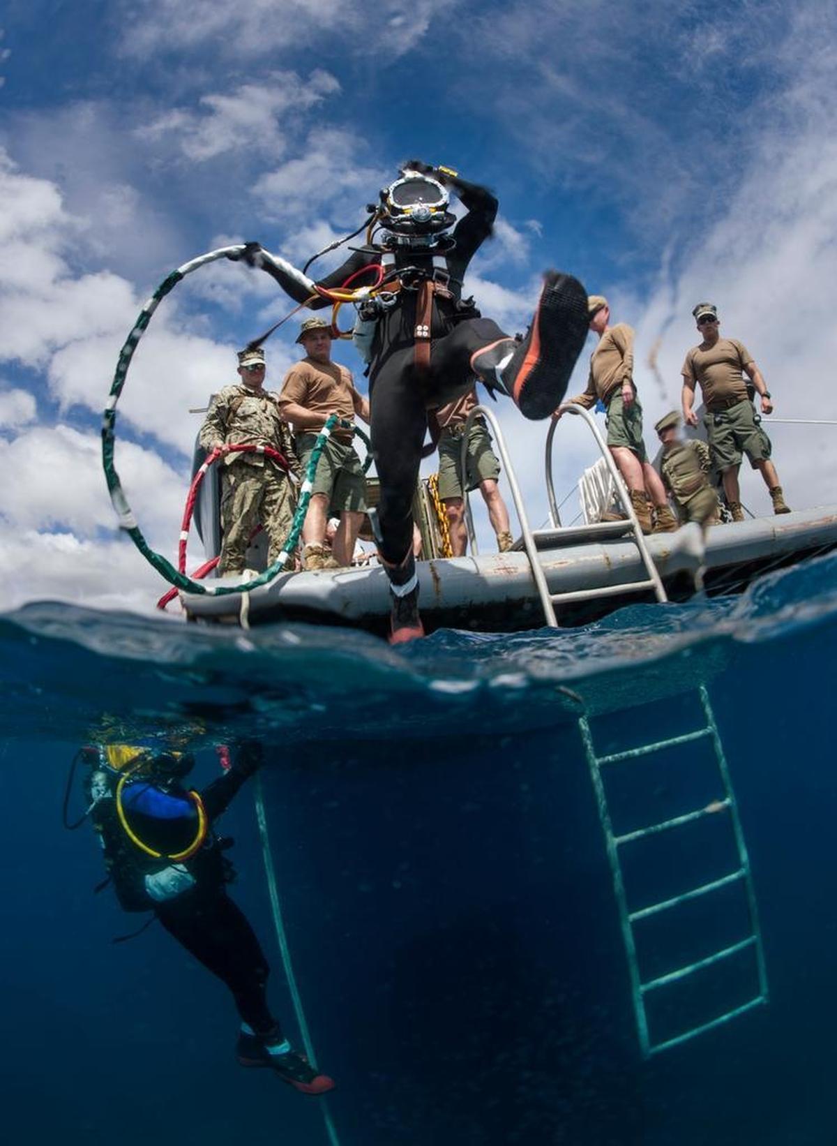 Seabees assigned to Underwater Construction Team conduct surface-supplied diving operations during diver-qualification training off the coast of U.S. Navy base Guantánamo on Feb. 12, 2017, in this Navy photo.